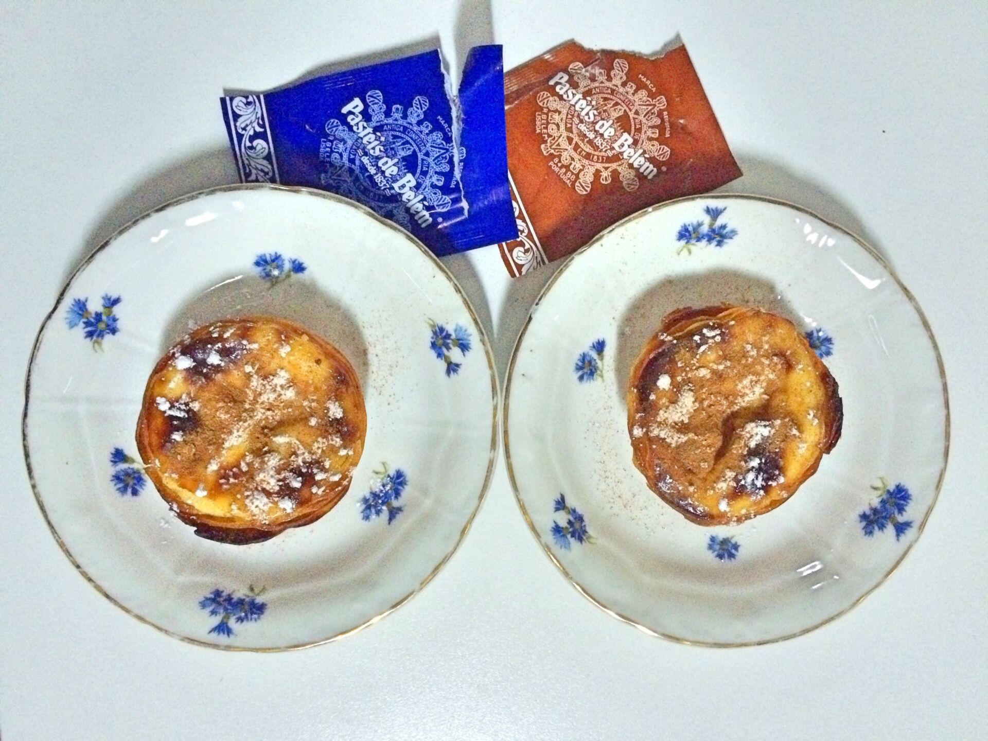 Delicious Pastéis de Belém on vintage Vista Alegre saucers